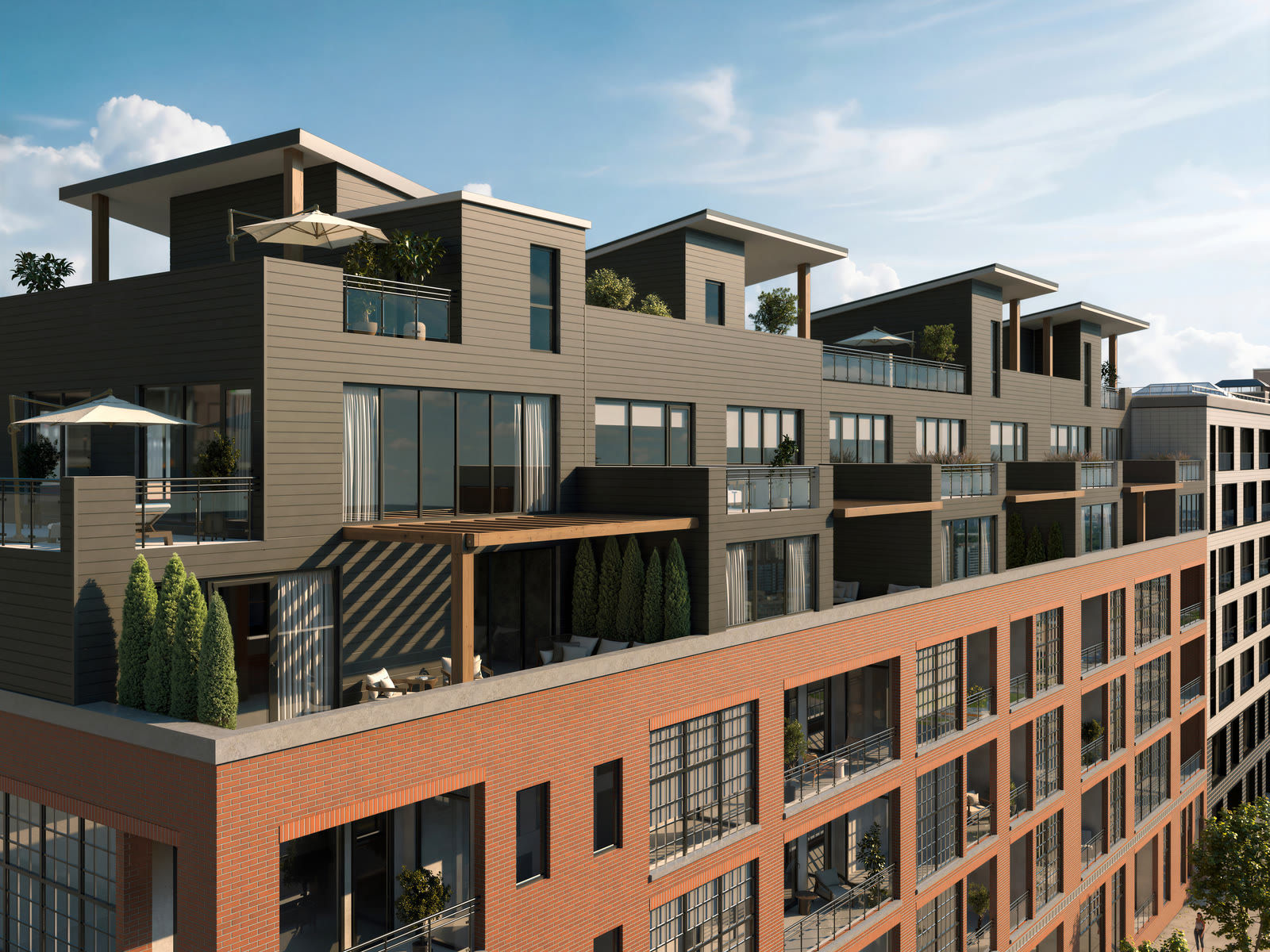The rooftop townhomes with private decks and pergolas
